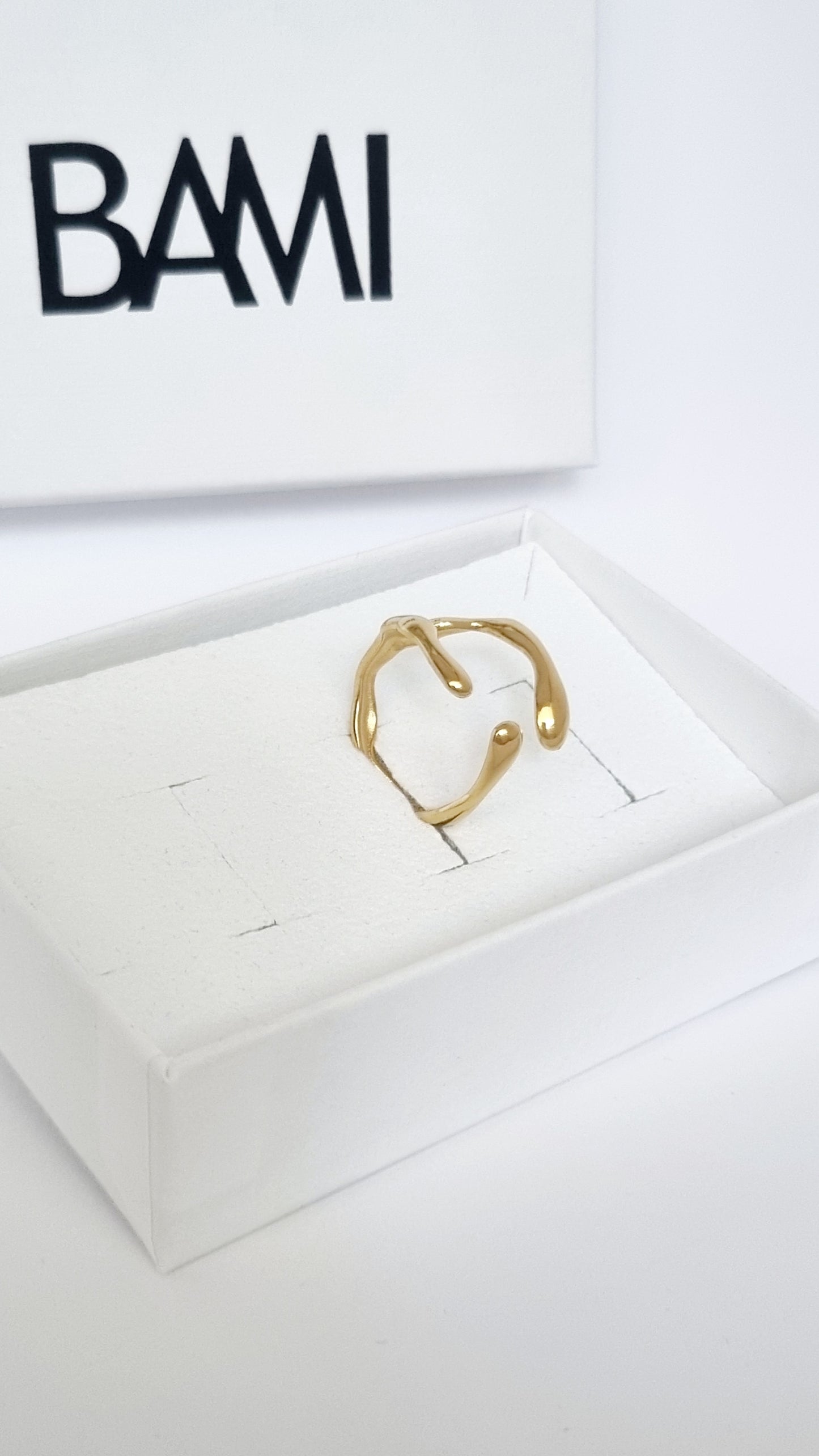 Bague asymétrique griffes ouverte ajustable